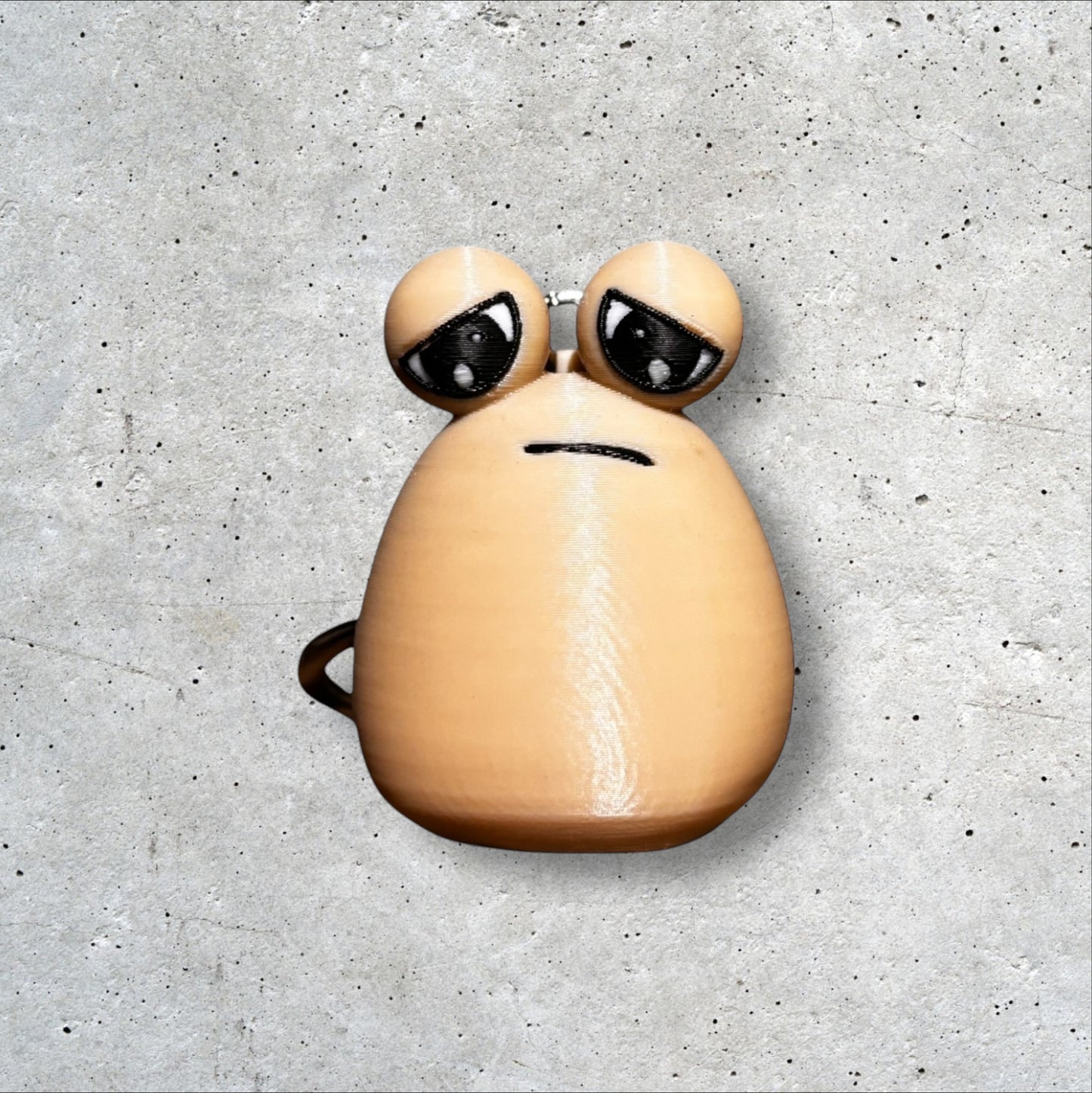 Llavero Pou triste