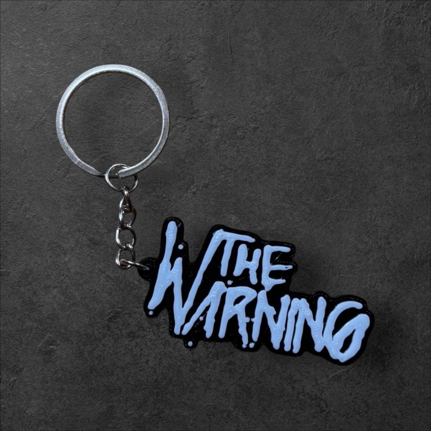Llavero The Warning