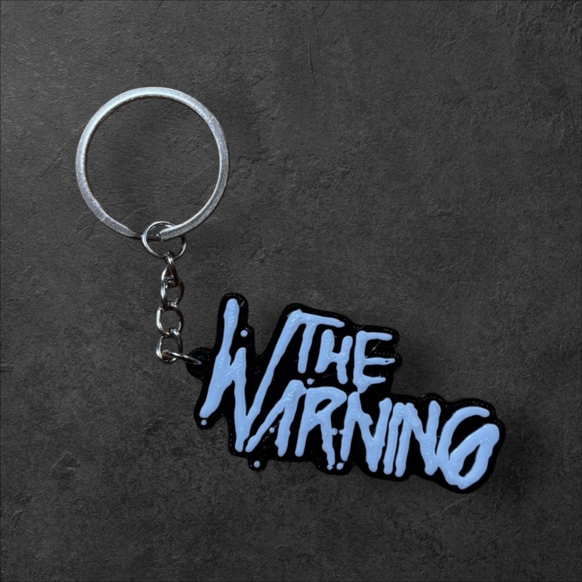 Llavero The Warning
